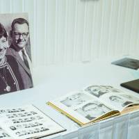 Yearbooks and photo albums from the class of '68 at the Reunion Dinner.